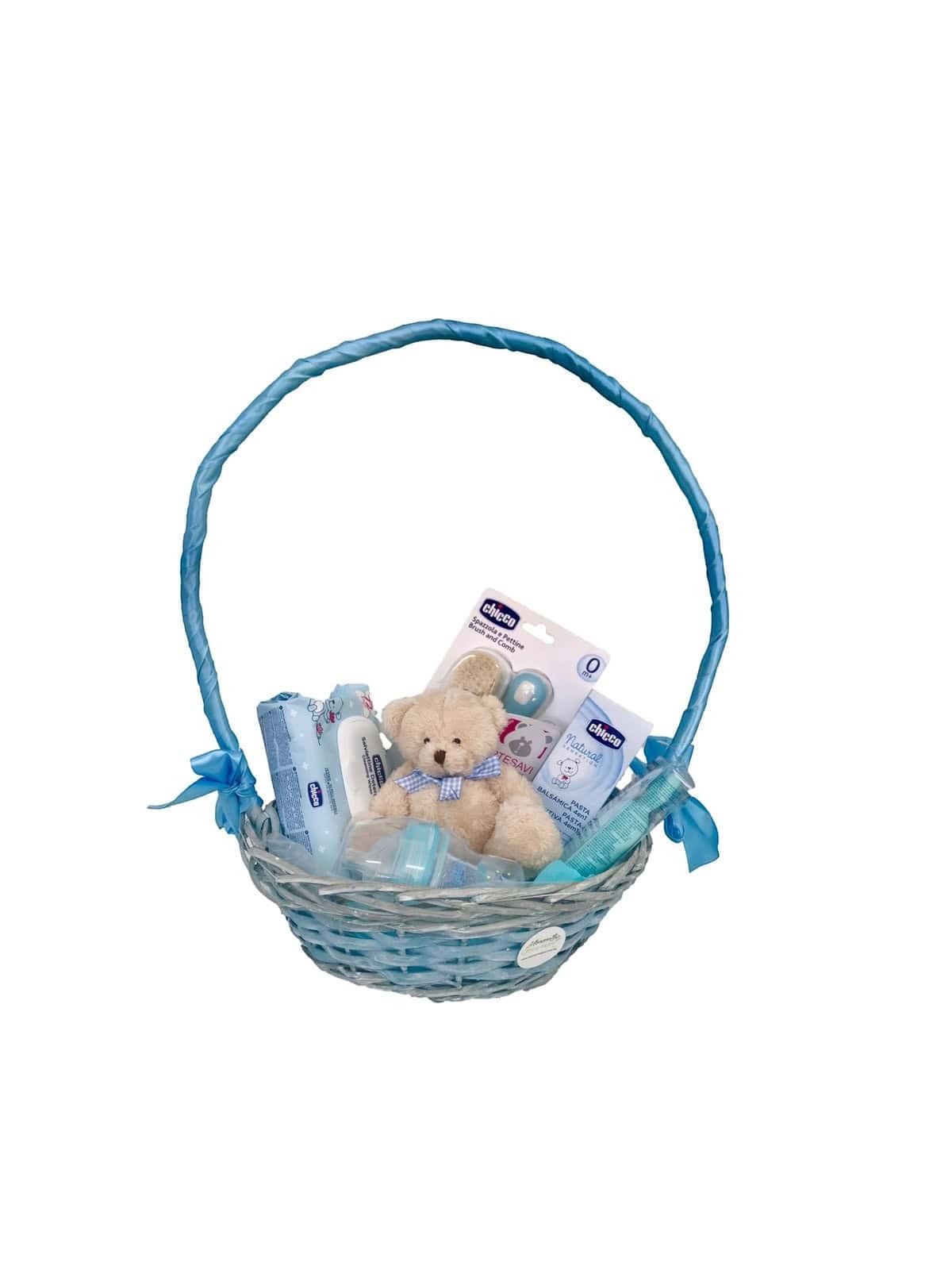 Canastilla de regalo MomentosGourmet con productos Chicco para bebé, incluye peluche, peine, cepillo y artículos de aseo