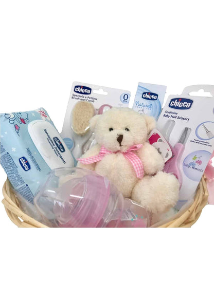 Canastilla de regalo MomentosGourmet con productos Chicco, osito de peluche y accesorios de aseo para recién nacido