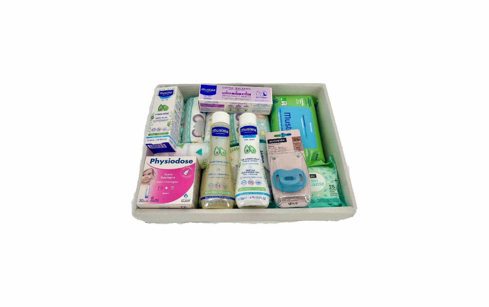 Canastilla de regalo MomentosGourmet para recién nacido con productos de higiene Mustela y accesorios Suavinex
