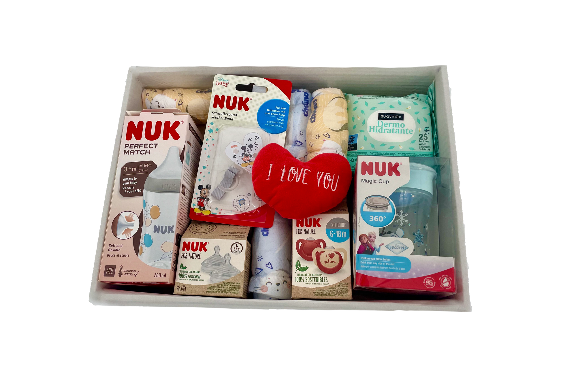 Canastilla de regalo MomentosGourmet para recién nacido con biberones, chupetes NUK y accesorios de cuidado infantil