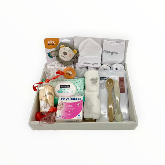 Canastilla MomentosGourmet para recién nacido con Dou Dou león Interbaby, productos Suavinex, muselina y ropa de bebé.