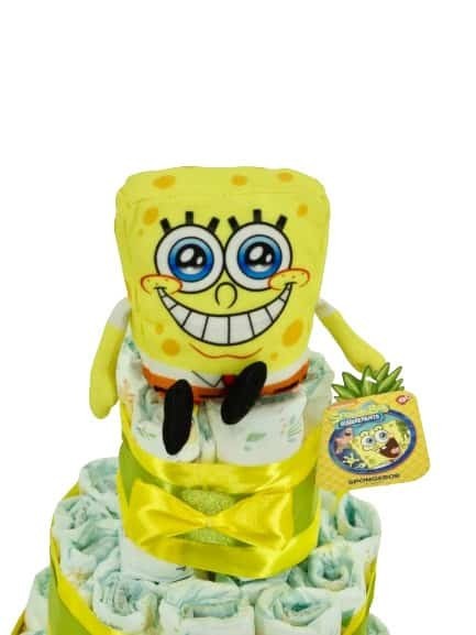 Tarta de pañales MomentosGourmet con peluche oficial de Bob Esponja, decorada con lazos amarillos para regalo de bebé