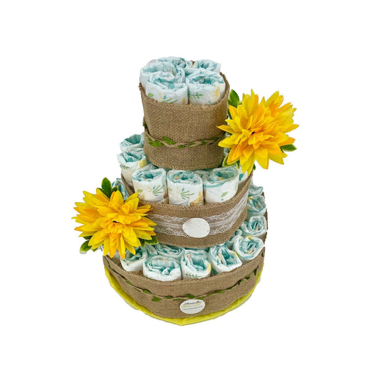 Tarta de pañales Summer de MomentosGourmet decorada con flores amarillas, yute y encaje, ideal para baby shower.