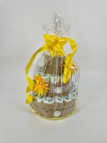 Tarta de pañales Summer de MomentosGourmet decorada con lazo amarillo y flores, ideal para baby shower